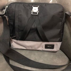 Tummy crossbody bag in good condition no stains,no rips . A lot of pocket’s